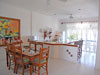 White walls show off the colorful handcrafts and art.